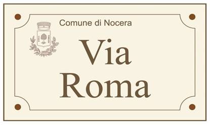 Targa viaria cm. 50x30 in laminato plastico stratificato con bordino, completa di nome strada, logo e nome comune incisi